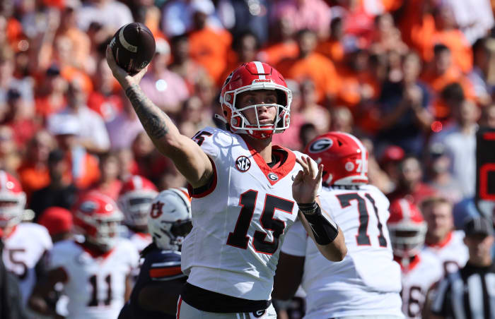Sep 30, 2023; Auburn, Alabama, USA; Georgia Bulldogs quarterback Carson Beck (15) throws a pass against the Auburn Tigers during the first quarter at Jordan-Hare Stadium.